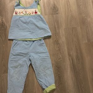 Size 5 smocked outfit with ladybugs and insects on it.